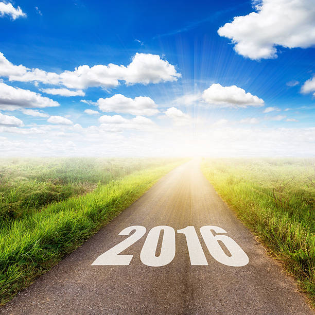 istock country road and field blue sky with white clouds. 503386030
