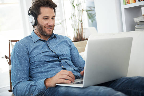 istock Updating his playlist 503389200