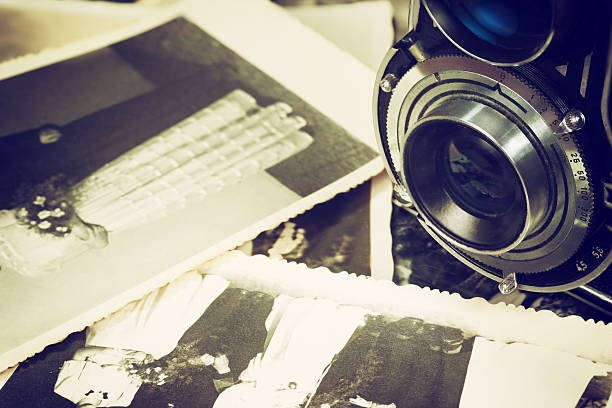 istock Old wedding photos and old camera 503389578