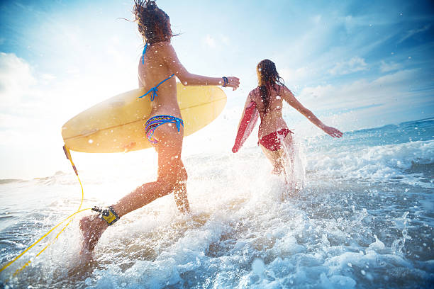 istock Ladies surfers 503391516