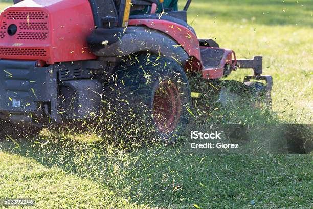 Riding Lawn Equipment With Operator Stock Photo - Download Image Now - Lawn Mower, Riding, Motorized Vehicle Riding