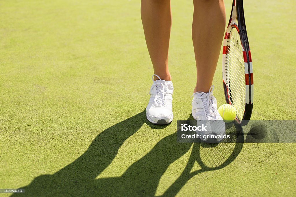 Tennis player Close-up of tennis player legs Grass Stock Photo