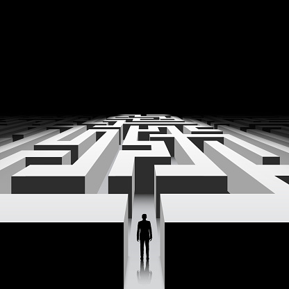 Dark labyrinth. Silhouette of man. Stock vector image.
