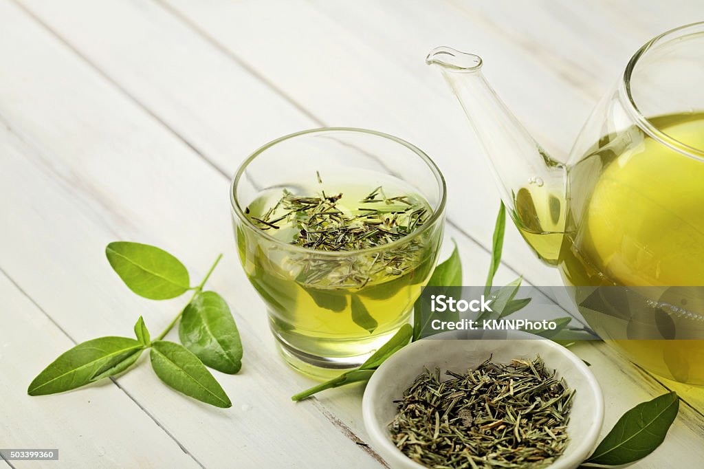 tea tea cup with tea leaves Green Tea Stock Photo
