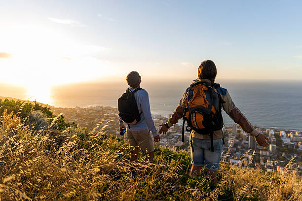 istock Hikers enjoying fresh wind on hill 503399906