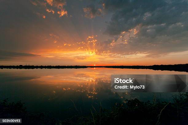 Reflected Sunset Stock Photo - Download Image Now - Cloud - Sky, Environmental Conservation, Horizontal