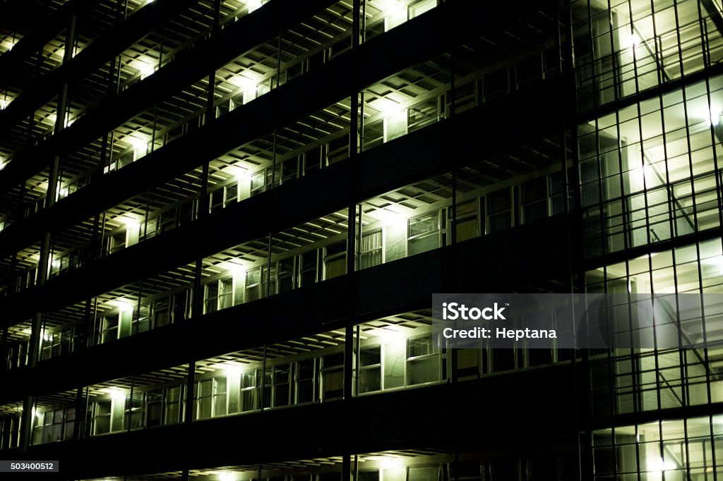 Apartment building at night Close up of an apartment  building at night with illuminated hallway. Abstract Stock Photo