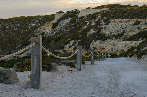 Coastal cliif footpath wooden pole fence