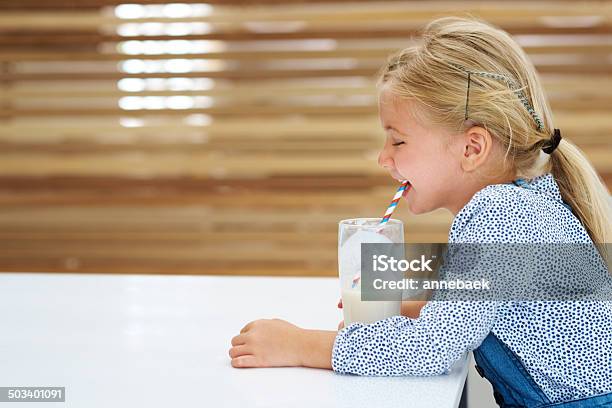 Settling Down For A Cold One After A Long Day Stock Photo - Download Image Now - Blond Hair, Casual Clothing, Cheerful