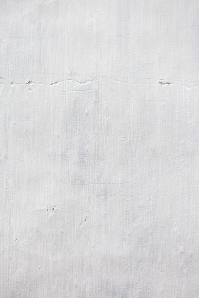 istock Grungy white concrete wall background 503403125