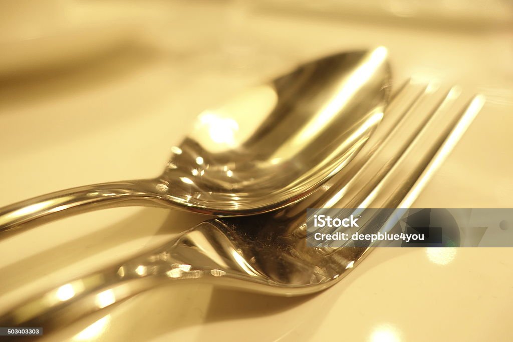 Spoon and fork - golden toned Copy Space Stock Photo