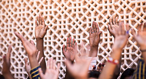 Hands up Hands up in India. india crowd stock pictures, royalty-free photos & images