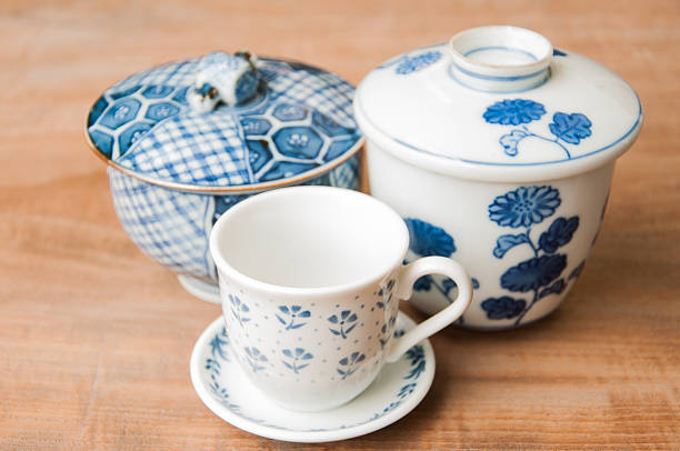 istock Blue bowl on wooden background, antique 503405601