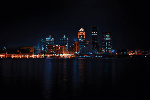 Louisville Skyline Looking at the Louisville, KY skyline at night ohio river photos stock pictures, royalty-free photos & images