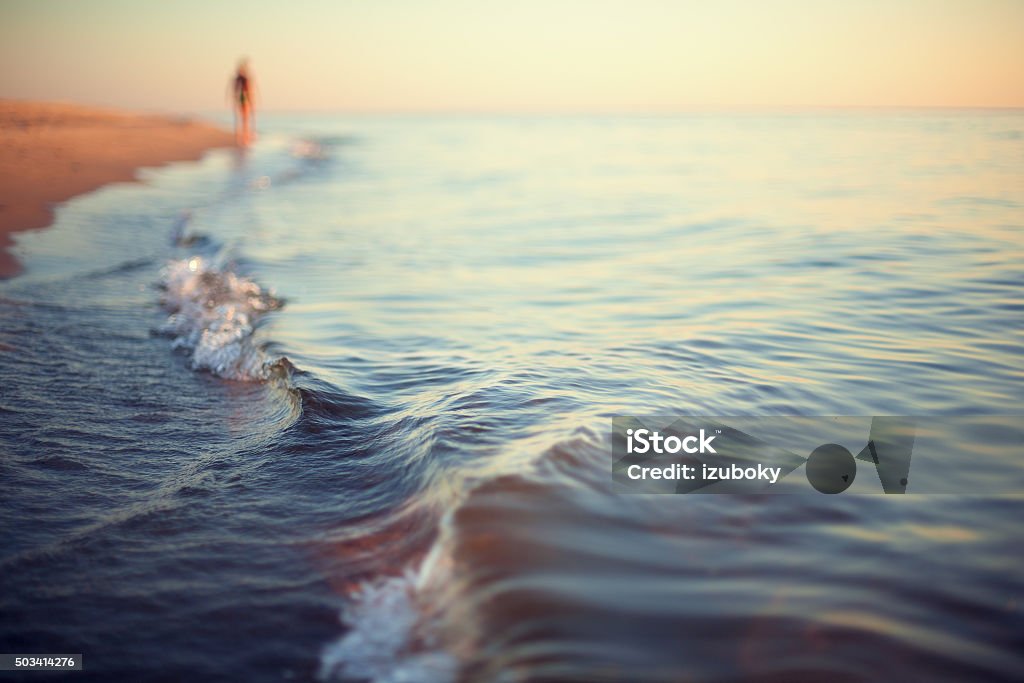 beach sunset abstract background shoreline beach sunset abstract background shoreline close up Beach Stock Photo