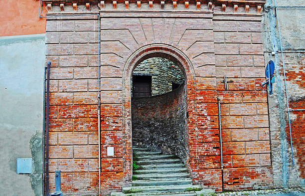 istock arch in a brick wall in Brisighella 503416362