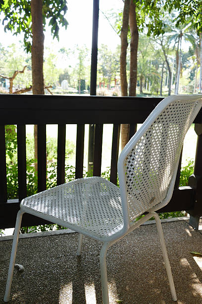 istock white metal chair on the balcony 503416398