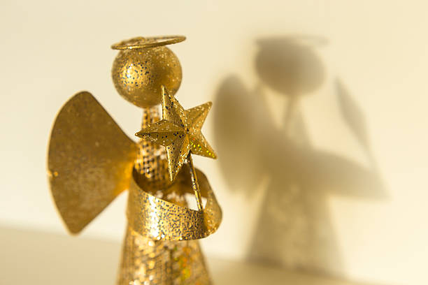 istock angel with star in the hands 503416656