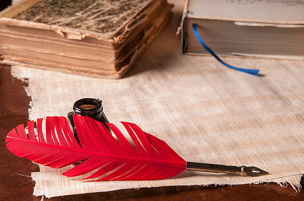istock Quill pen and papyrus paper 503416906