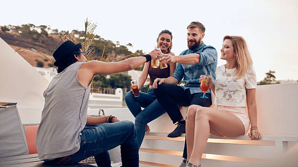 istock Group of friends enjoying drinks party 503417656