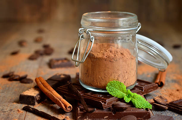istock Cocoa powder in a glass jar. 503418706