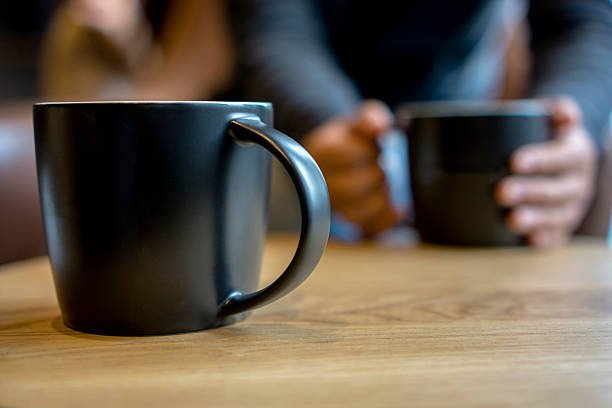 istock black coffee cup on table, chatting and dating 503418756