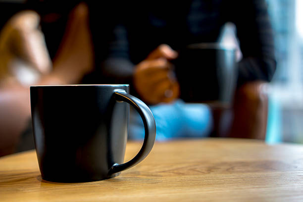 istock black coffee cup on table, chatting and dating 503418894