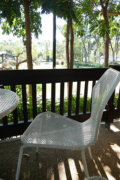 istock white metal chair on the balcony 503420122