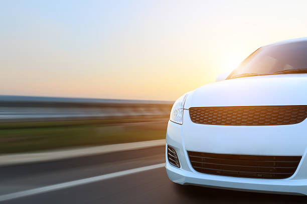 istock movement car speed on asphalt at sunset 503420962