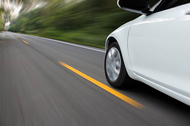 istock speed movement car on rural asphalt road 503421100