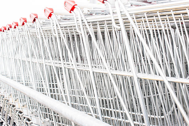 istock Many empty shopping carts in a row. 503423934