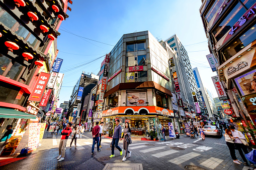 Seoul, Korea - October 3, 2015 : Myeong-Dong shopping street, Korean people tourists walking shopping the neighbourhood. It is fashionable to be the most popular. neighbourhood is must when traveling.