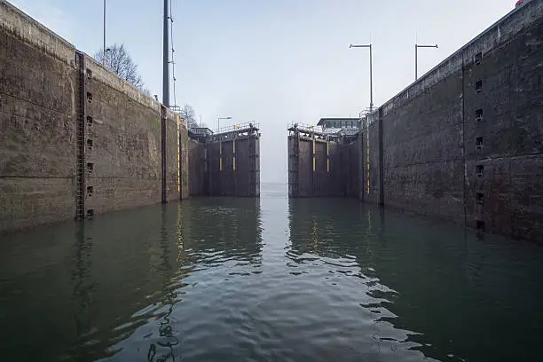 Sluice complex with water filled reservoir and sluice complex in Passau (Kachlet) at the Danube River.