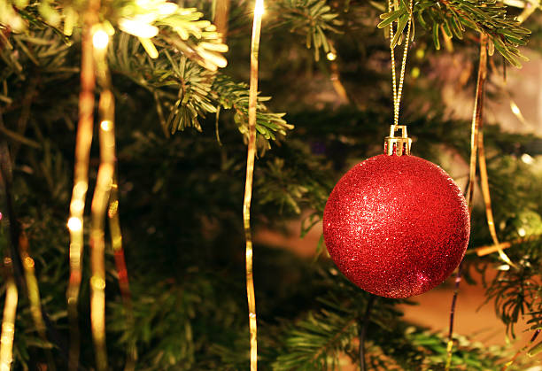 Detail of bright red christmas tree decoration stock photo