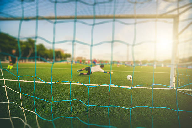 istock Shooting at goal - soccer stadium 503434105