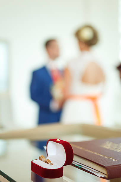 istock Wedding rings and marriage certificate 503434125