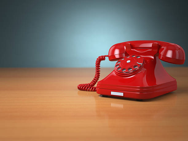 istock Vintage phone on green background. Hotline support concept. 503435965