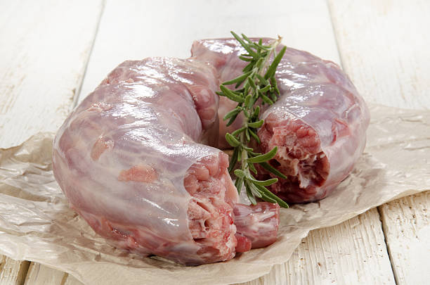 raw turkey neck with rosemary