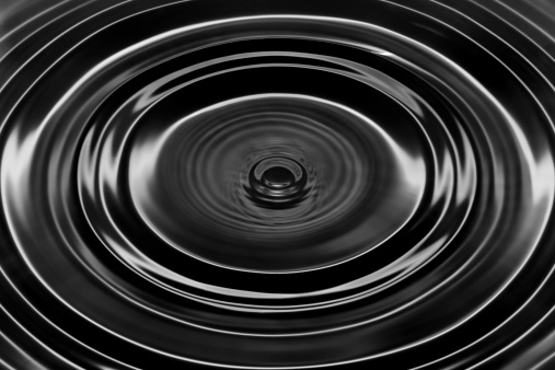 Black oil dripping. Abstract black and white circle liquid drop ripple texture background