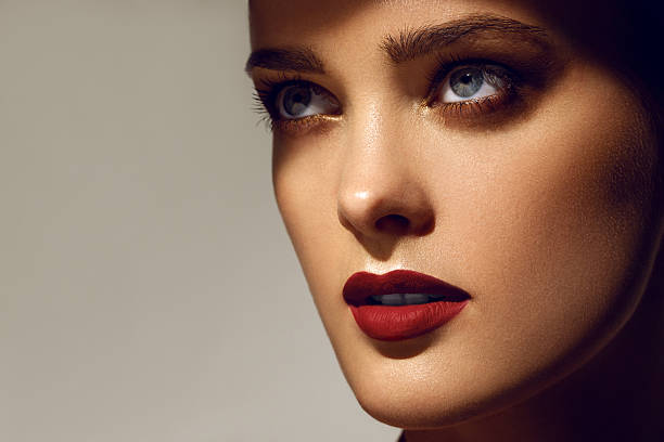 istock Beautiful young model with red lips. Gorgeous Woman Face. 503438325