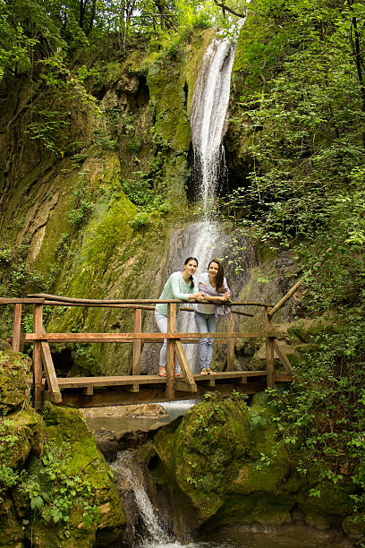 istock Two women laughing outdoor 503453429