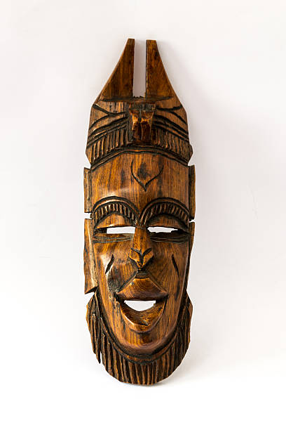 istock Wooden african mask on a white paper 503453737