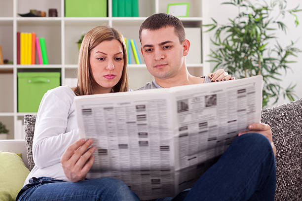 istock Couple reading news 503453855