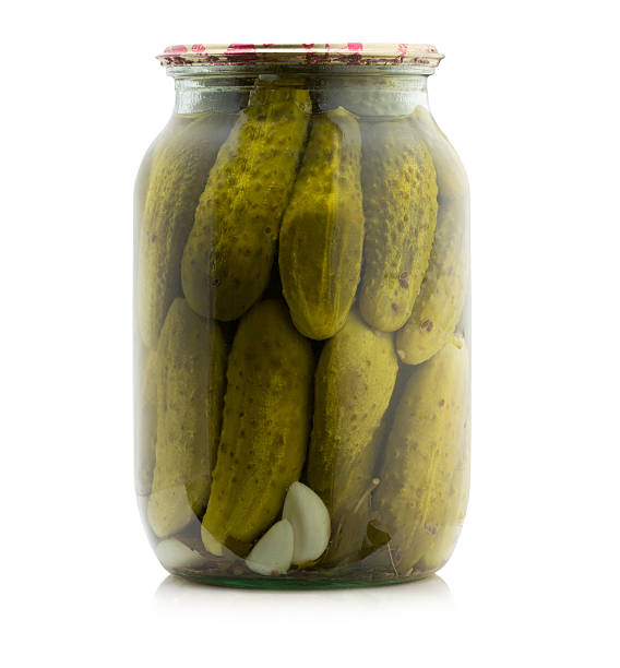 istock Marinated cocumbers canned in glass jar 503456414