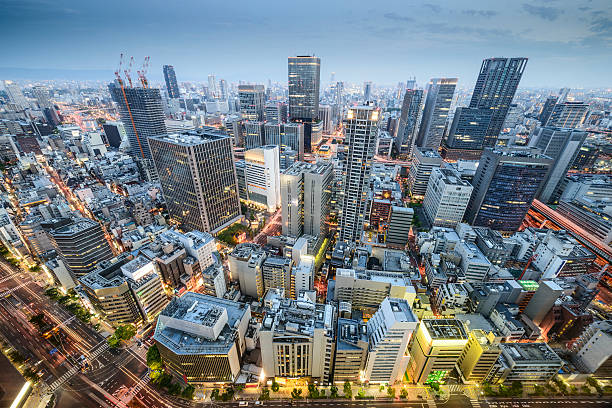 Osaka, Japan Osaka, Japan aerial cityscape in the Umeda District. osaka prefecture stock pictures, royalty-free photos & images