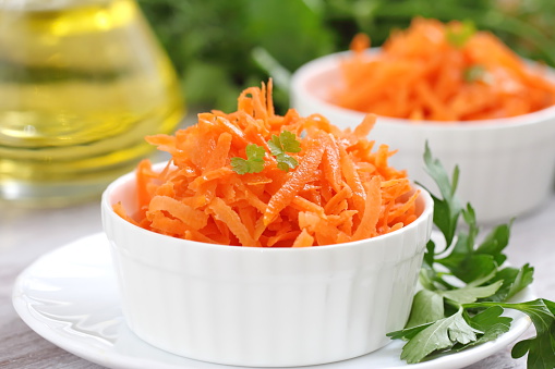 Salad with fresh carrot and oil
