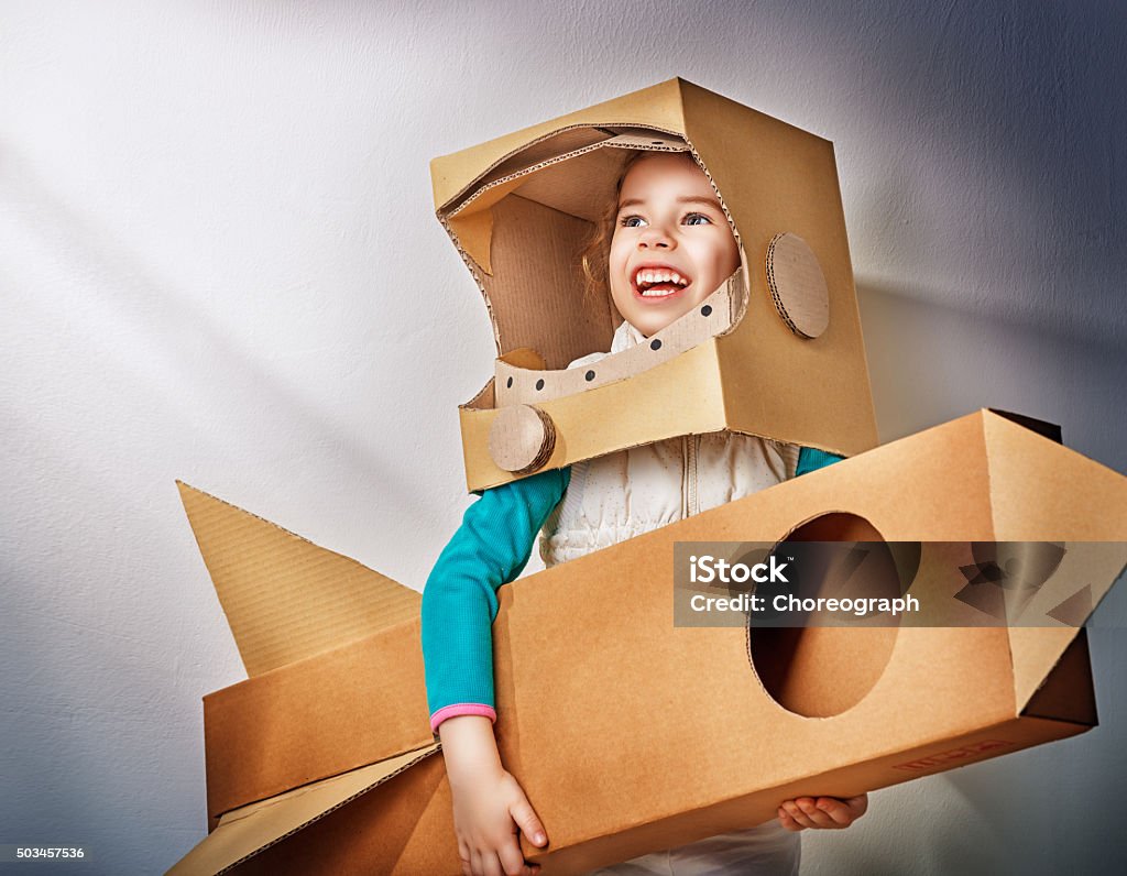 astronaut child is dressed in an astronaut costume Child Stock Photo