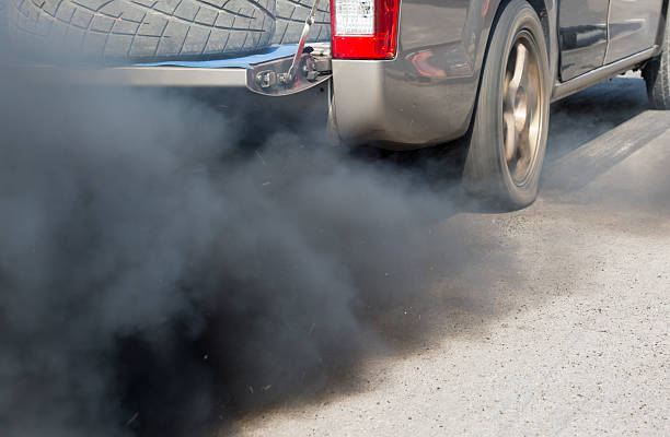 istock Air pollution from vehicle exhaust pipe on road 503458866