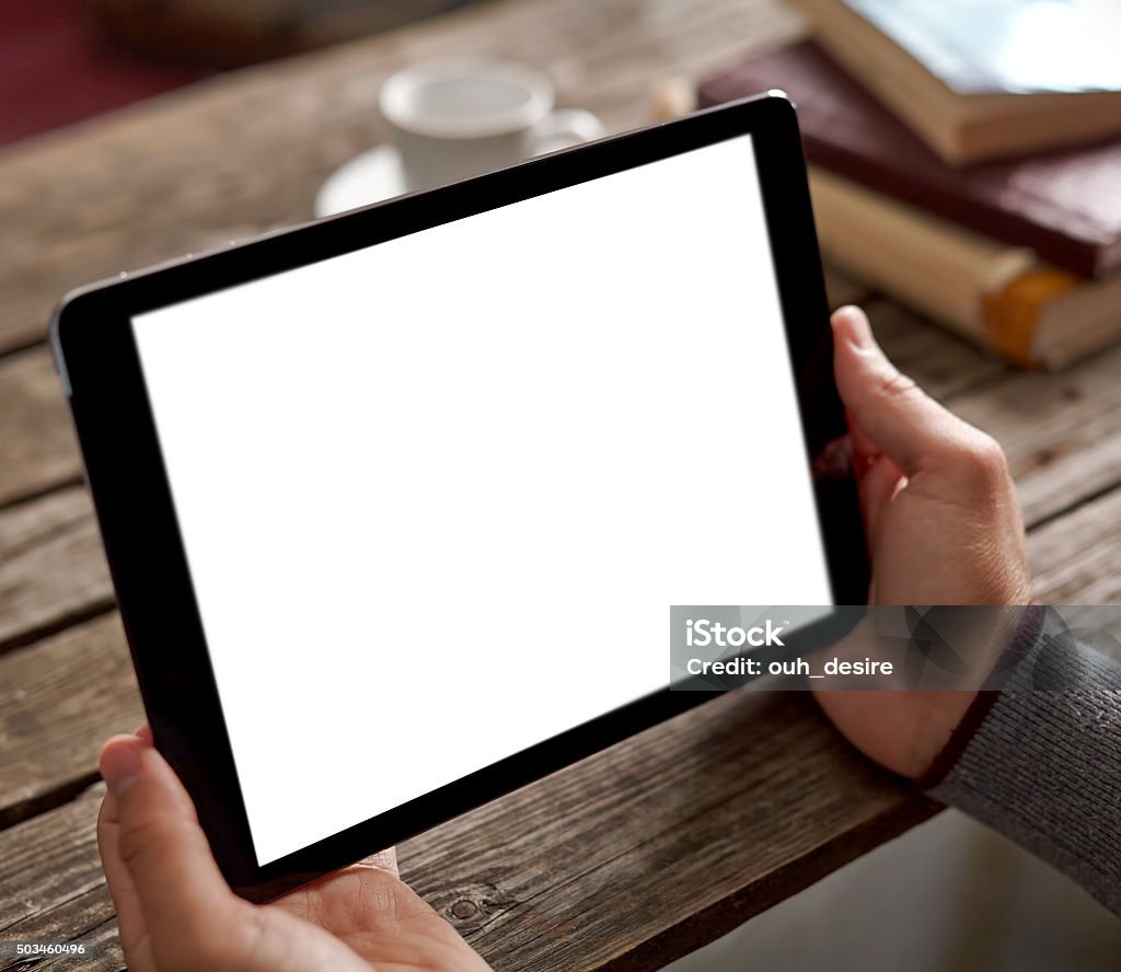Man shows screen of tablet in his hands Man shows isolated screen of black digital tablet in his hands. Adult Stock Photo
