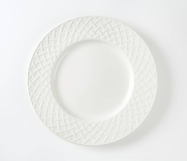 White porcelain plate with decorative rim